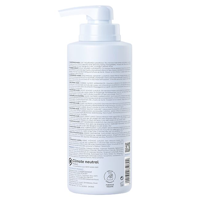 White bottle with pump and label on a white background