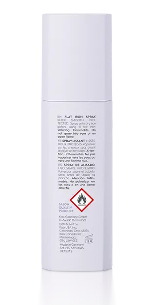White spray bottle with text and a red warning label on a white background
