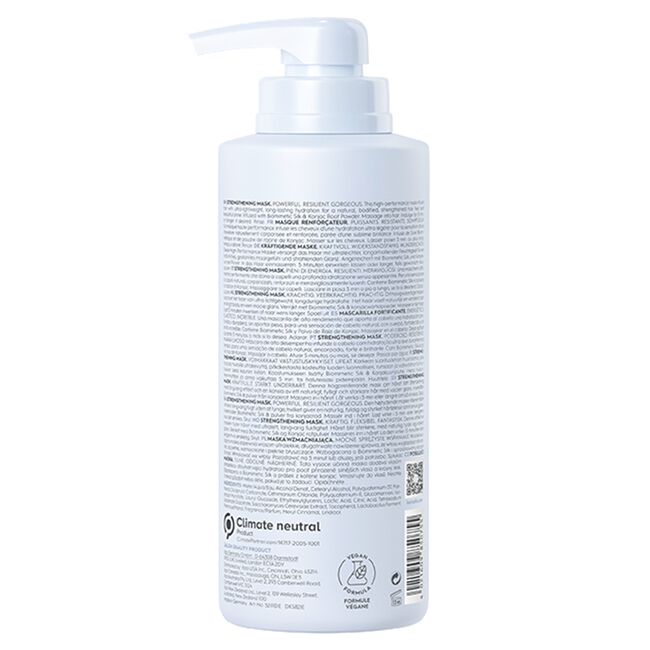 White bottle with pump on a white background