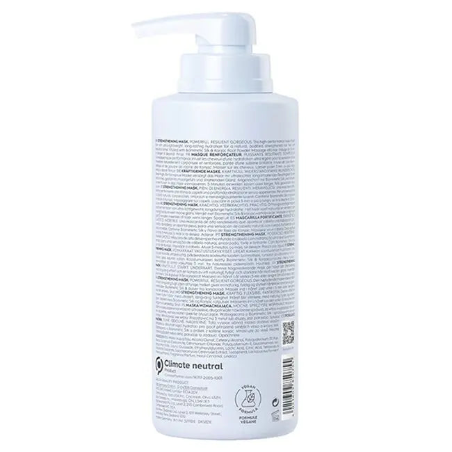 White bottle with pump on a white background