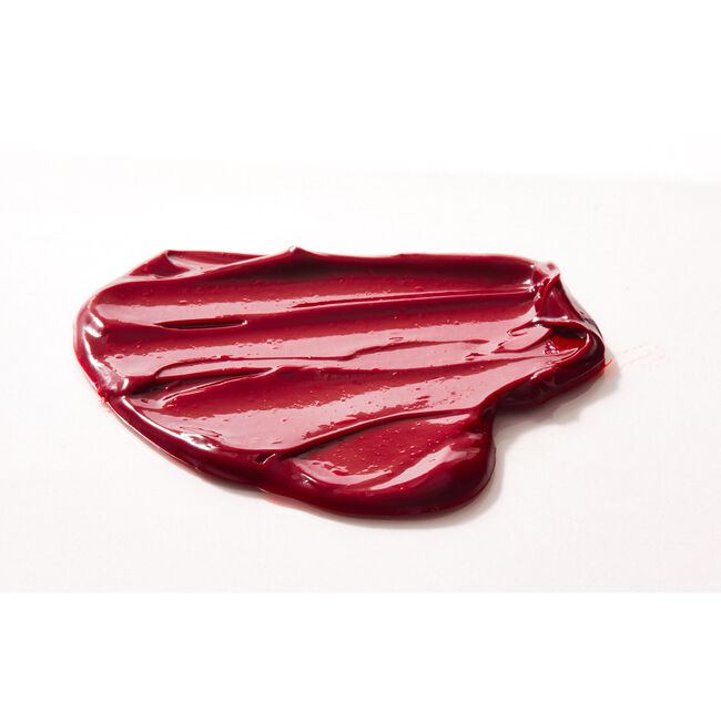 Red lipstick swatch on a white background