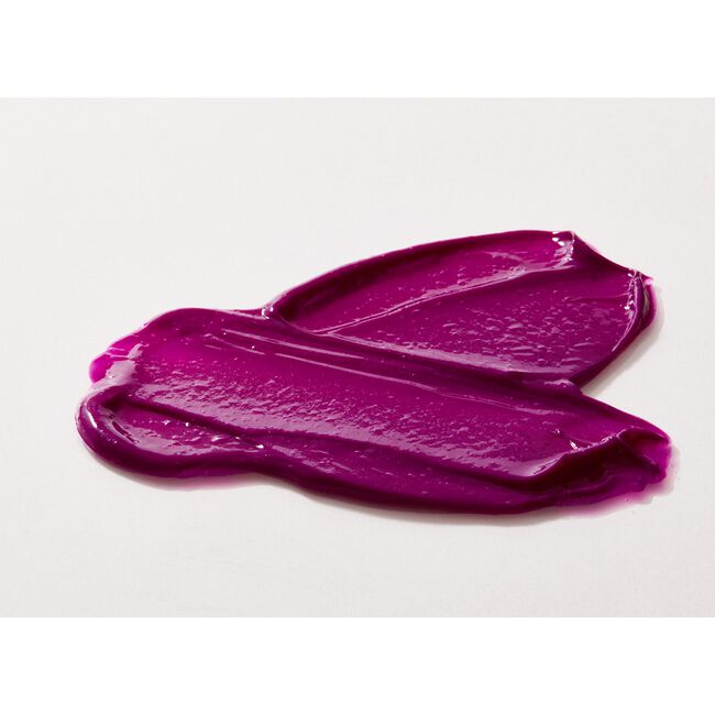 Two smears of purple cream on a white background