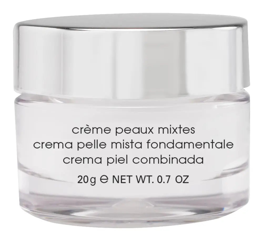 Skincare cream jar with metallic lid on a white background