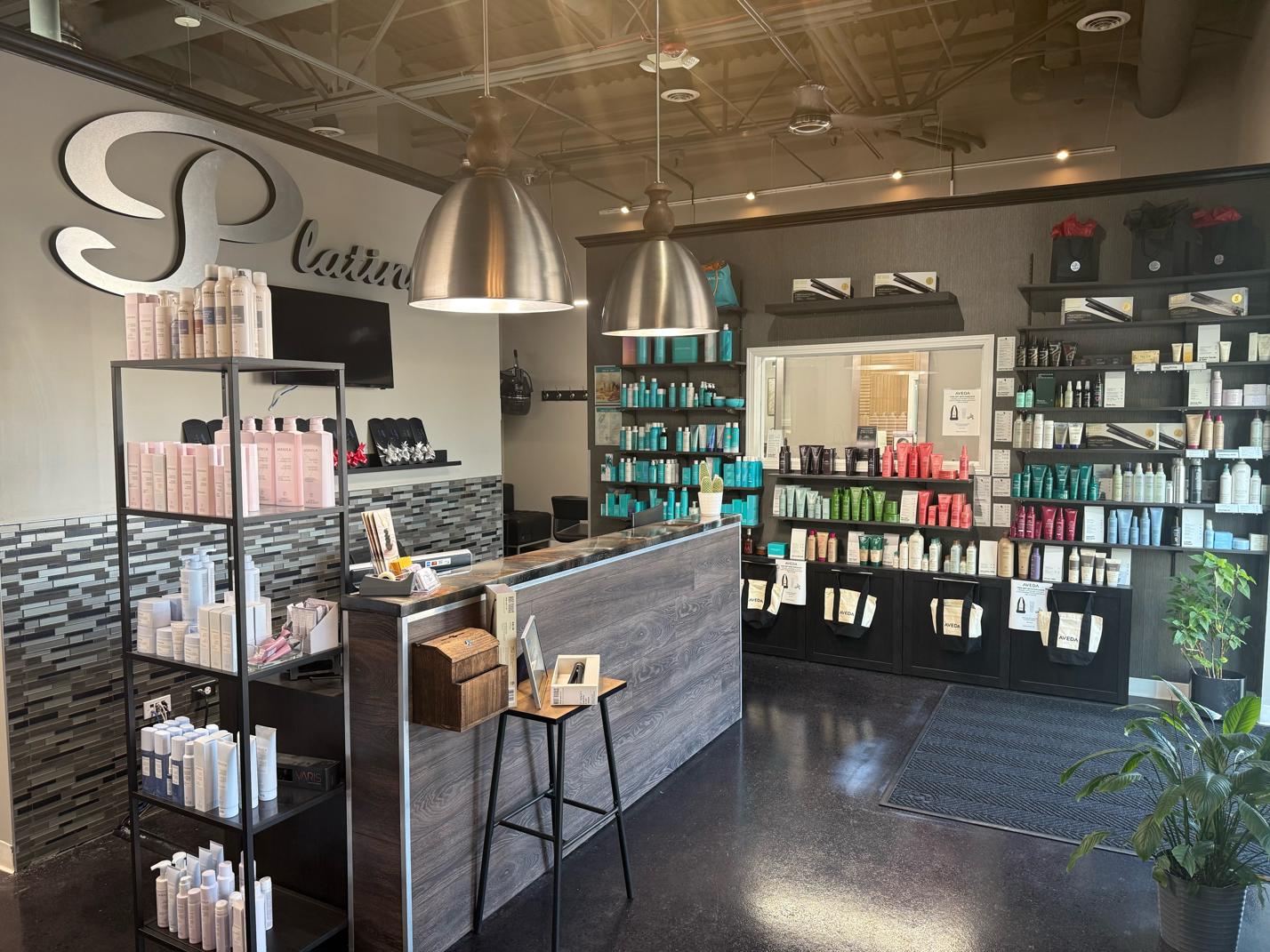 Reception Desk area with various hair retail products