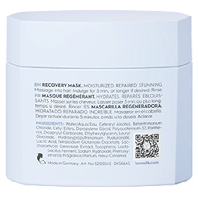 Back of a blue hair mask packaging with text and a QR code.