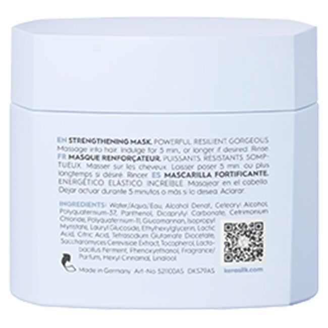 Back of a blue hair mask packaging with text and a QR code.