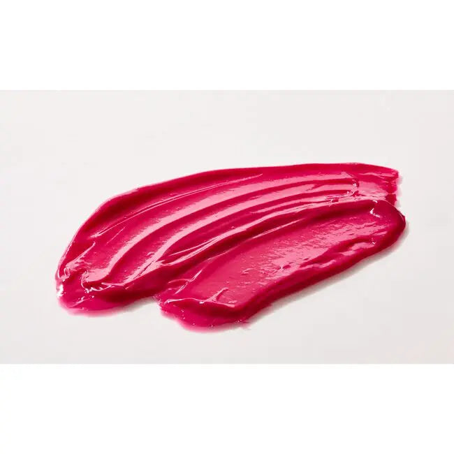 Three smears of bright pink lipstick on a white background
