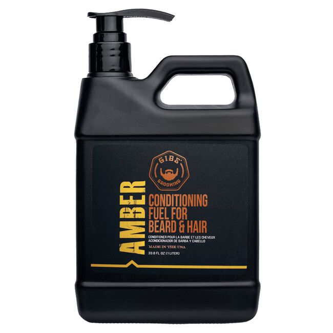 Black bottle of amber conditioning fuel for beard and hair with pump on a white background