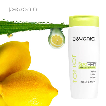 Pevonia toner bottle with lemons and a leaf on a white background
