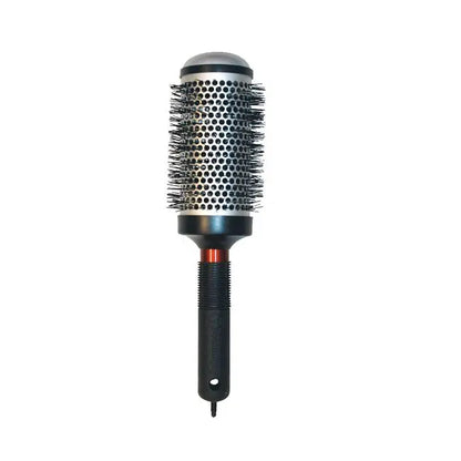 Hairbrush with black bristle head and black handle on a white background