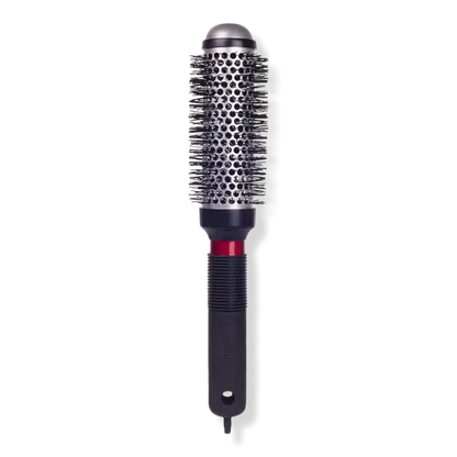 Hair styling tool with round brush head and cylindrical handle on a white background
