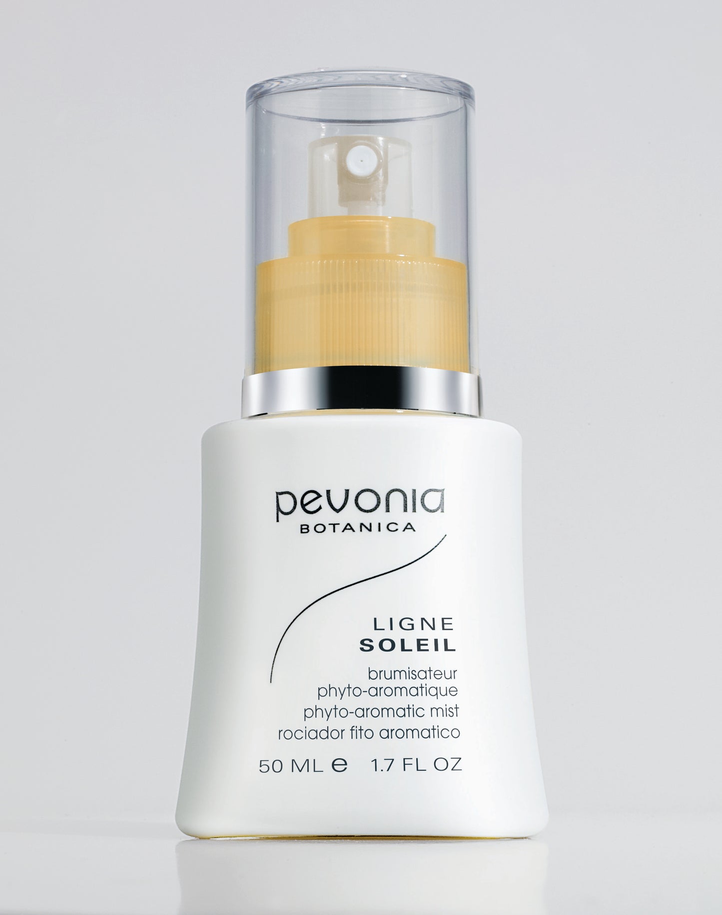 Pevonia Botanica sunscreen bottle on a light gray background