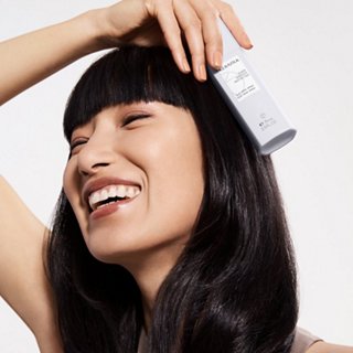 Kerasilk Flat Iron Spray with Female Model