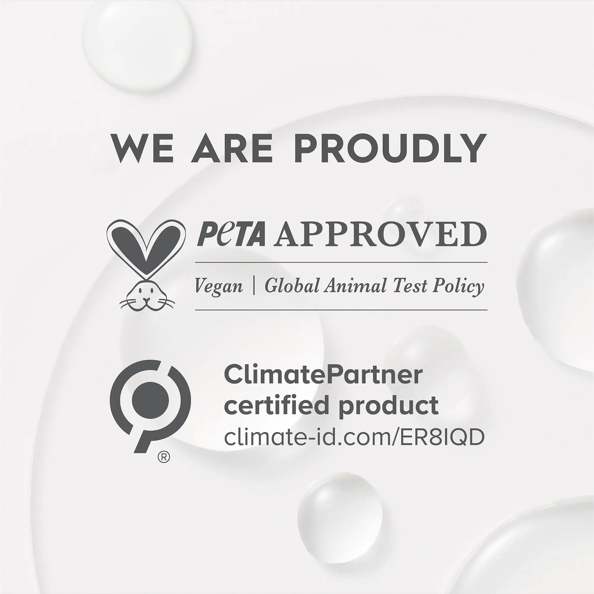 PETA Approved and ClimatePartner certified product labels on a white background with water droplets.
