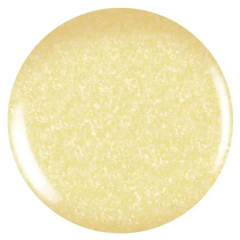 Round yellow object with a textured surface on a white background