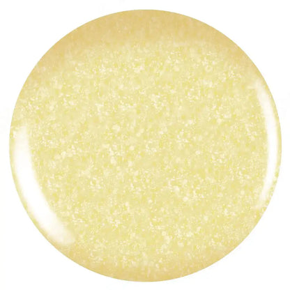 Round yellow object with a textured surface on a white background